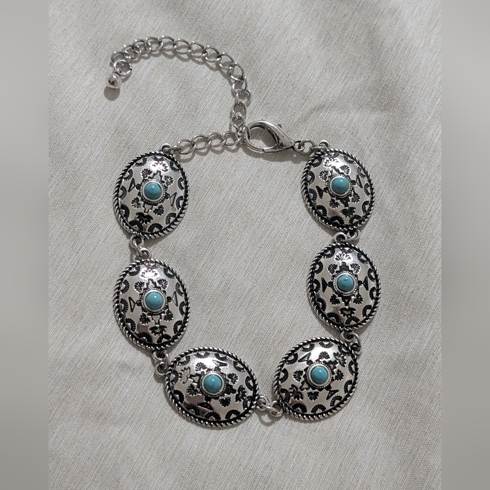 Intricate Silver Bracelet With Turquoise Accents